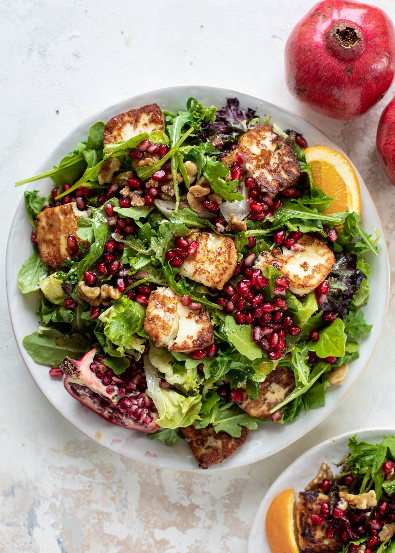 Read the Pomegranate Greens Salad with Halloumi Croutons and Spiced Orange Vinaigrette recipe now Pomegranate Greens Salad with Halloumi Croutons and Spiced Orange Vinaigrette